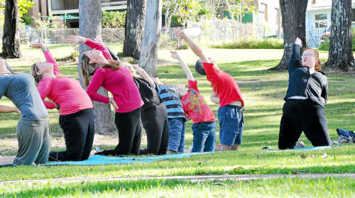 Yoga teacher Lisa Telford gets a class on the go at Moonee. Yoga teacher Lisa Telford gets a class on the go at Moonee.